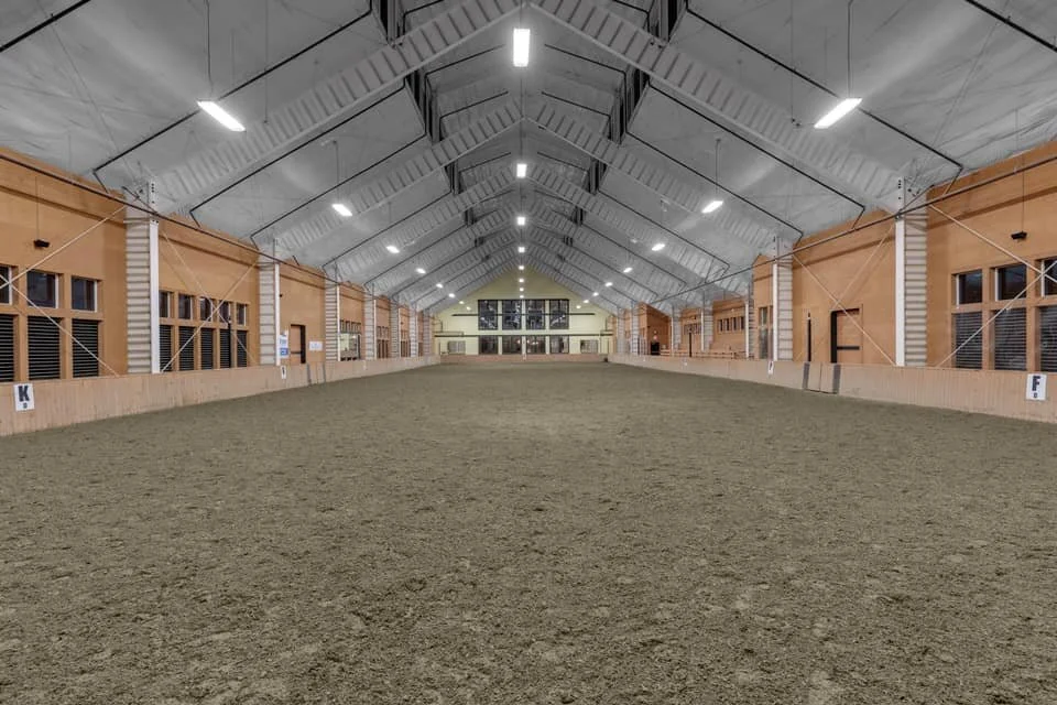 ReitenRight rubber arena footing blended into indoor riding arena sand and fiber