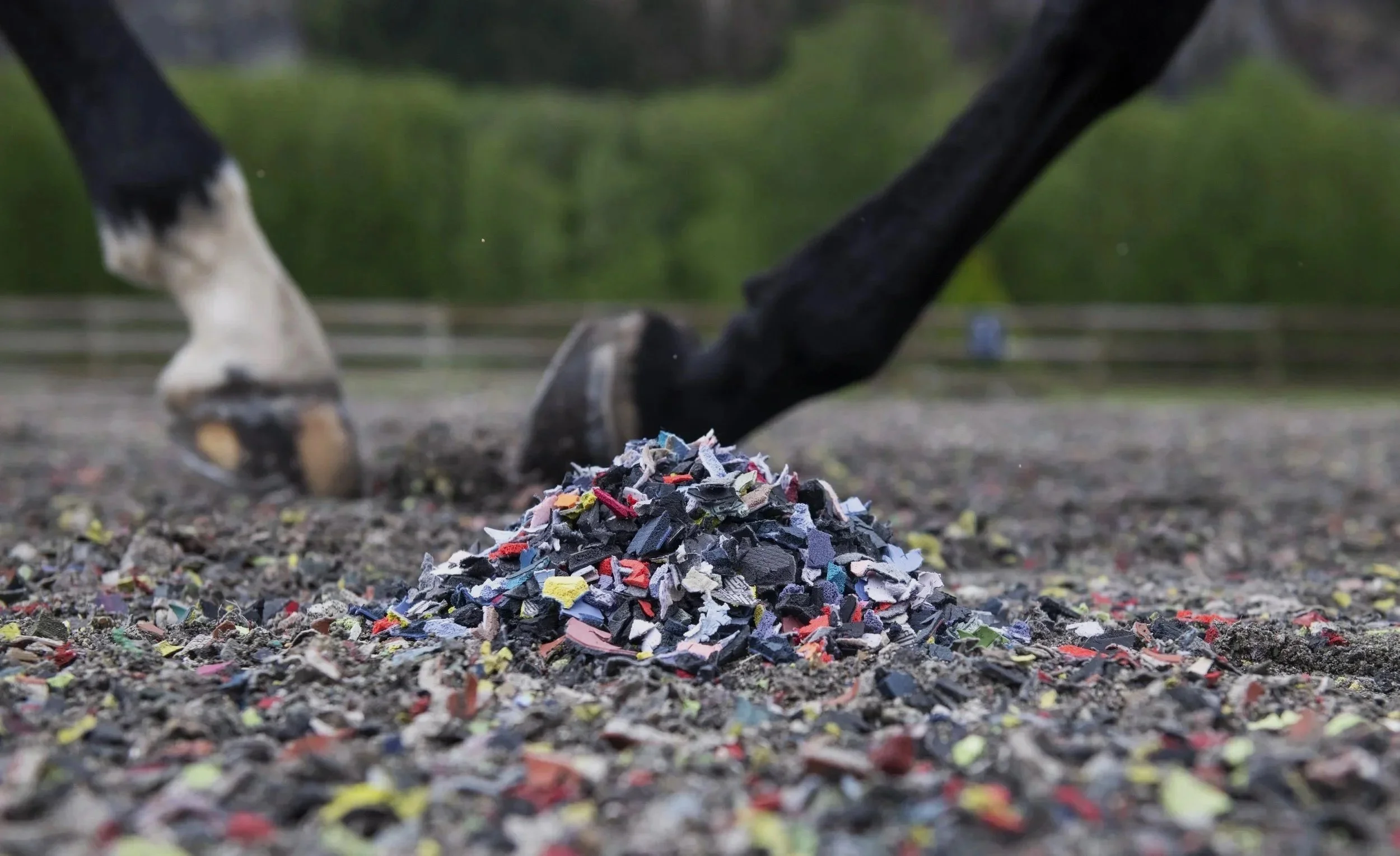 ReitenRight rubber arena footing blended into outdoor riding arena sand