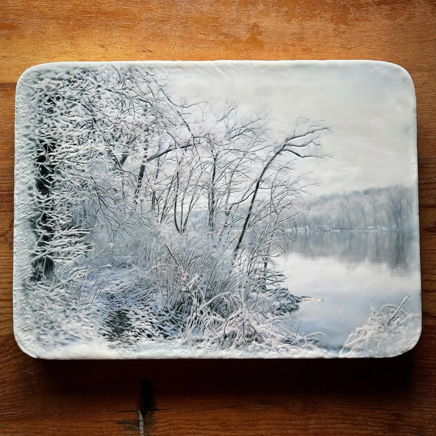 A few years back, on my birthday&mdash;April 23&mdash;I experienced a surprise blizzard. Although the snow melted by midday, I was able to capture the moment, with the riverbank&rsquo;s branches glistening under a fresh coat of snow. This photo has s