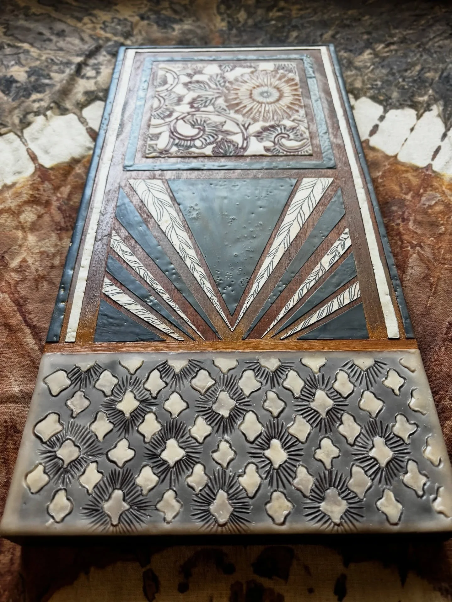 Encaustic on hardwood with oil paint and woodblock prints. 

#encausticmixedmedia #encaustic #mnartist #artdecostyle #encausticpainting