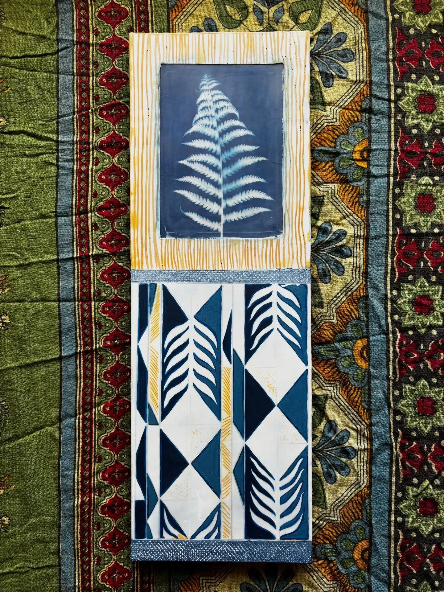 Frond and Form. Encaustic, cyanotype, and oil paint. 7x21 with yakisugi edges. 

#encaustic #mnartist #cyanotype #encausticpainting