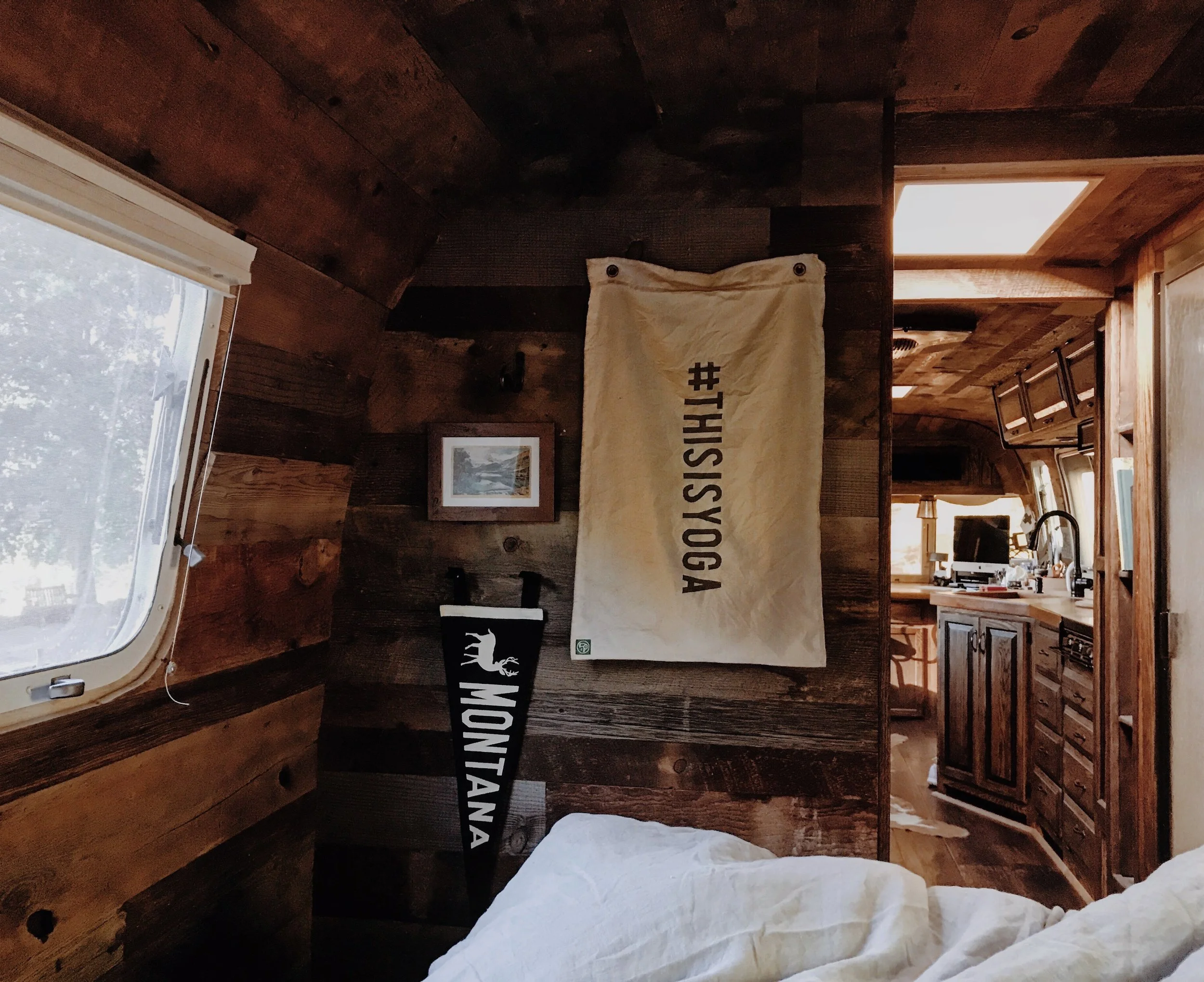 After the tears were shed and the acceptance of leaving Canada had been achieved our next stop was to stay with our friend Brett Colvin . He let us stay in his airstream that he remodeled himself! It was a dream, and when we walked in I saw that he'd made a #thisisyoga flag for us that is now hanging in my house! It was such a great two days spent on the lake, making burgers over the fire, drinking wine, watching the sunset and taking boat rides out on the lake. Thank you so much Brett for such a welcoming and amazing time. 