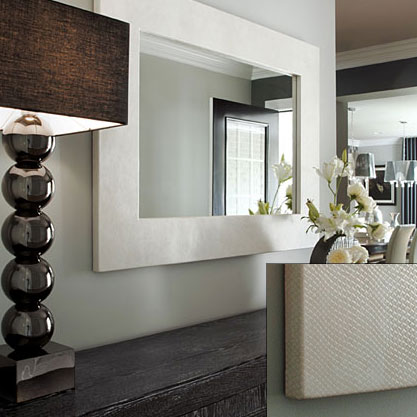 Snakeskin-framed mirror by Edelman Leather.