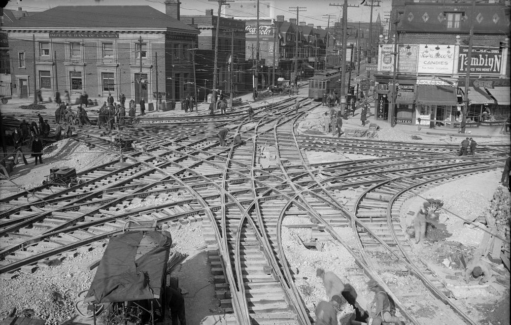 The intersection of Roncesvalles Avenue, Queen Street West, and King Street West, photographed by Alfred Pearson, 23 April 1923