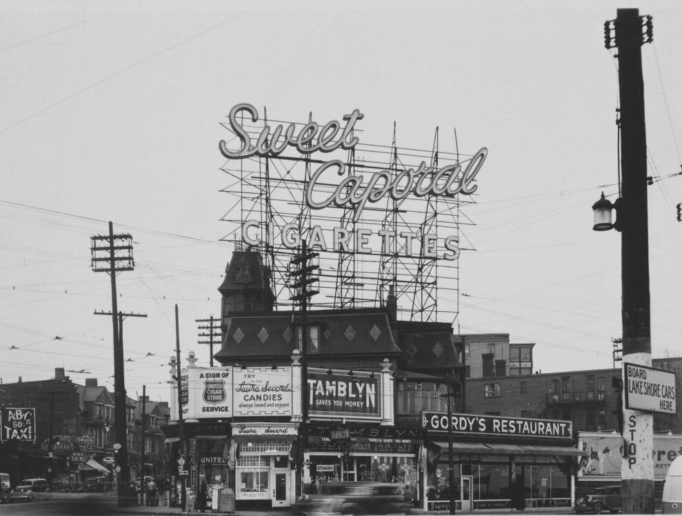 Neon advertising sign atop the Boulevard Apartments, designed and installed by the E.L. Ruddy Company between 1935 and 1937 for Sweet Caporal Cigarettes