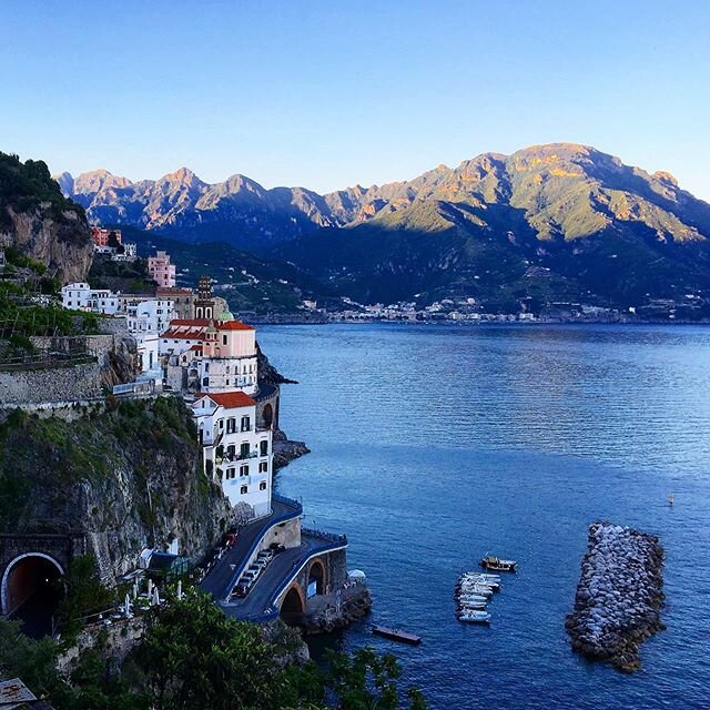 The Mediterranean Sea along the Amalfi coast in Italy. If you take a deep breath you can smell the salty ocean air. You can feel the warm humid air and you are glad the sun is setting just so it gets a little bit cooler. I&rsquo;m excited to be walki