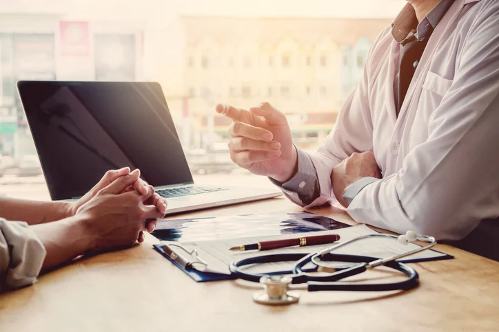 Doctor and patient with computer.jpg