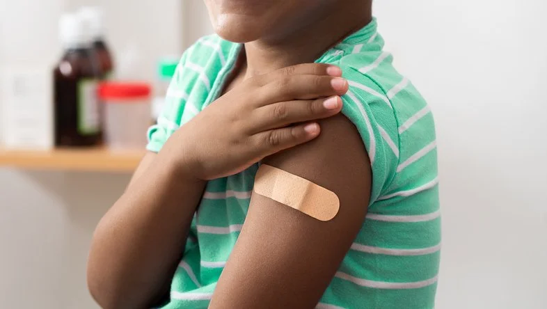 black-child-with-band-aid-on-his-arm-after-vaccination-2168547392_790x446.jpeg