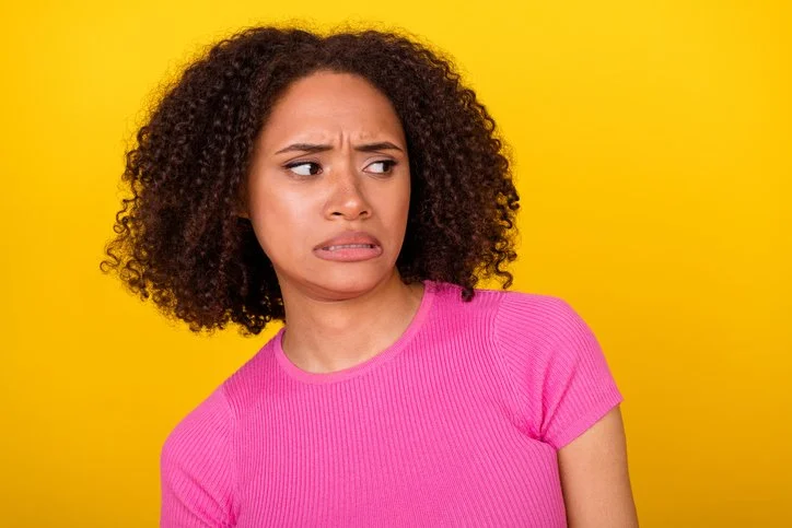 Photo-of-young-lady-dissatisfied-grimace-look-empty-space-isolated-on-yellow-color-background-1419287008_727x484.jpeg