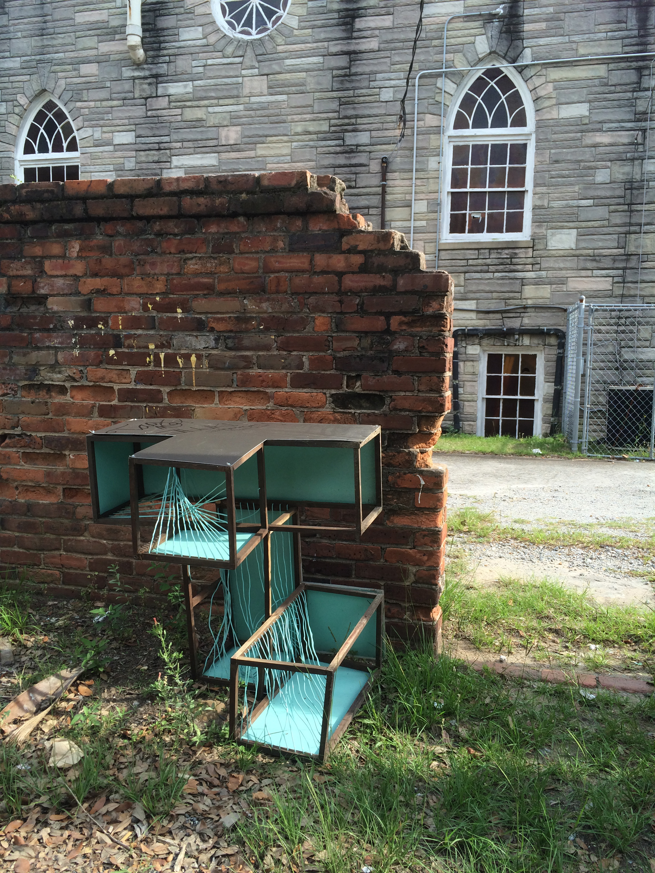 This situation, found in an alleyway, is a fairly accurate metaphor for Savannah culture. Its a combination of classic, gorgeous architecture, urban decay and wreckage, and a sizable population of art students.
