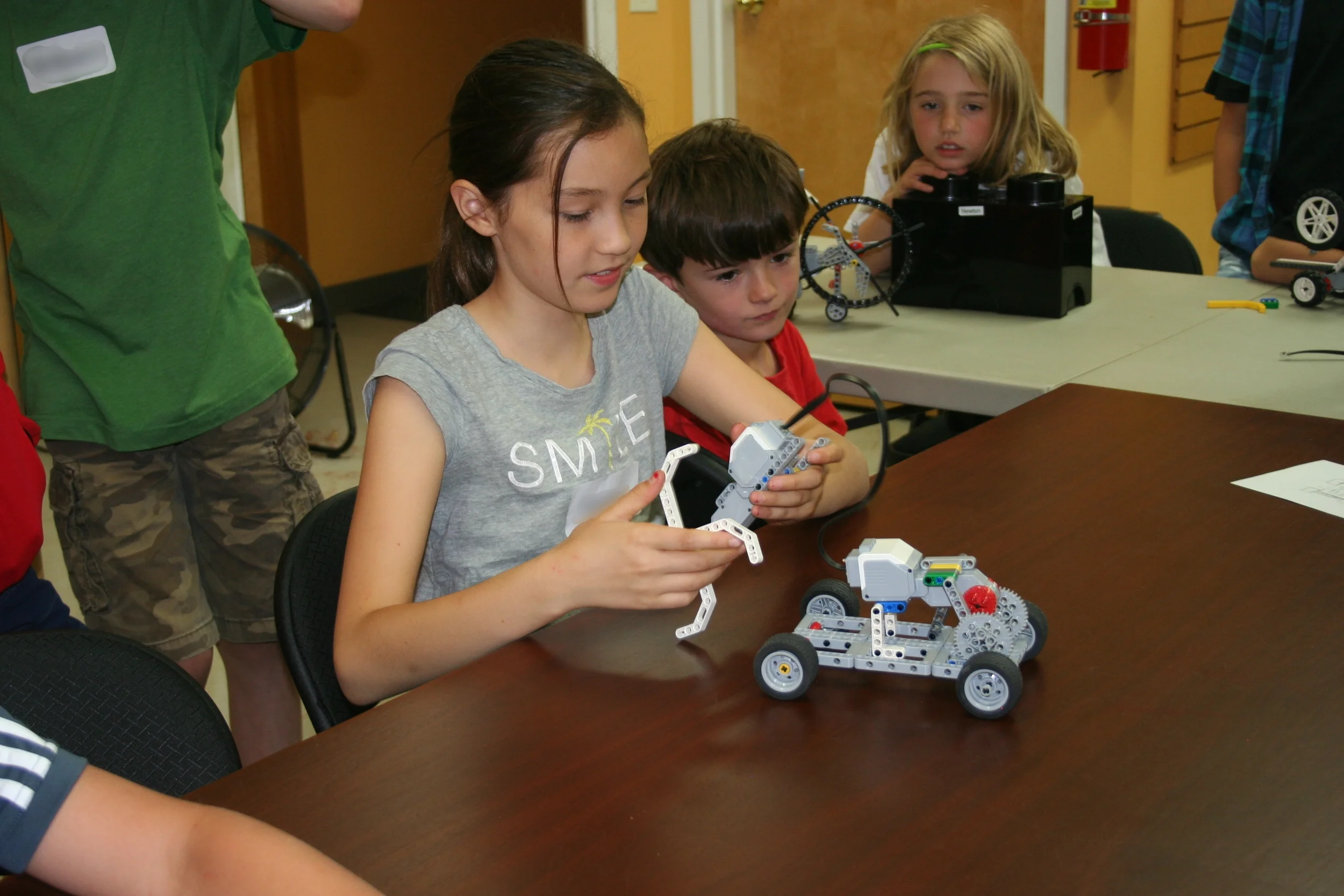  If only the Flintstones had this idea, a geared man/lady-powered car, they would have made it out of Bedrock. 