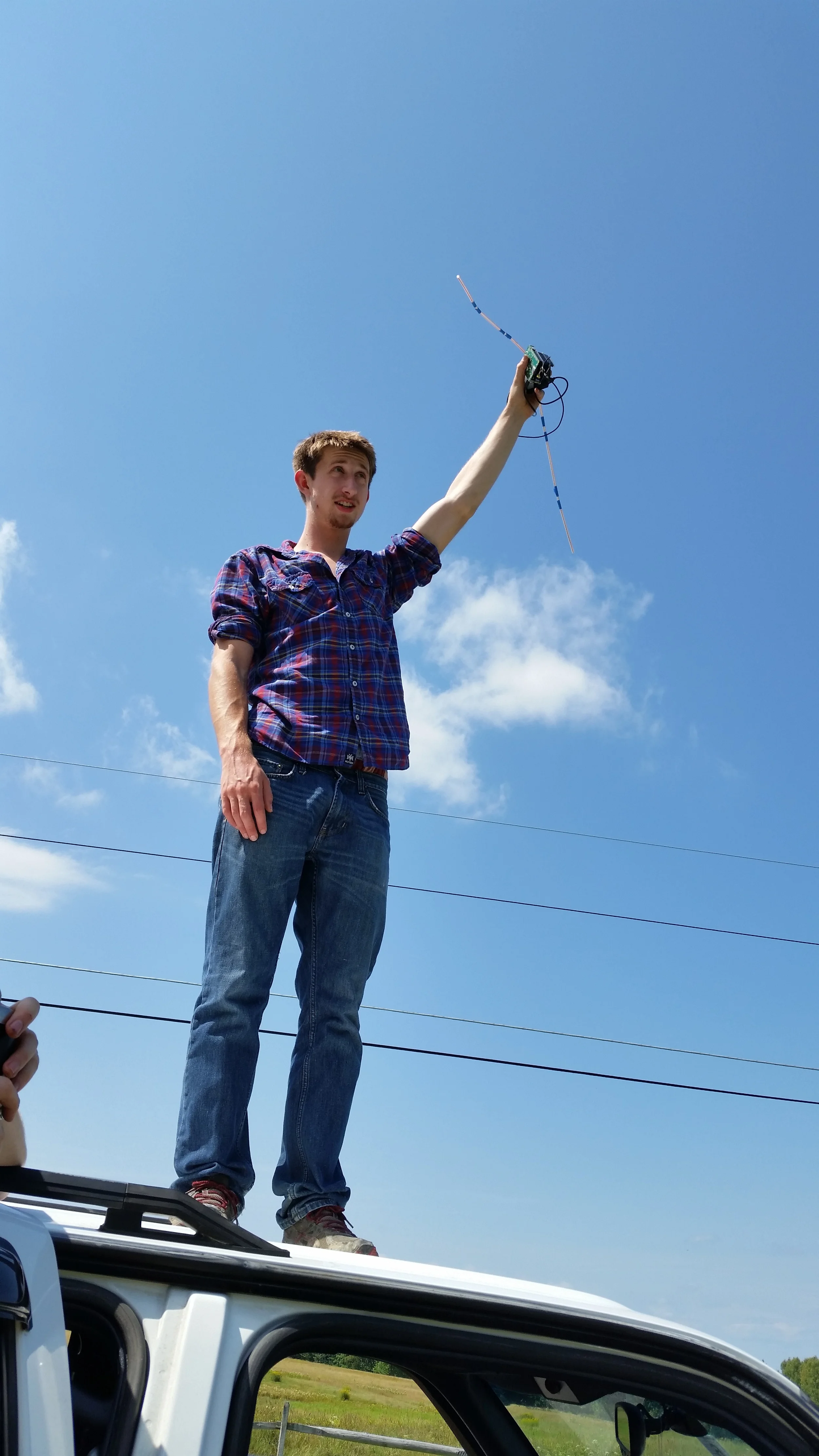 Ethan helping test out the APRS system. Here we are trying to get our signal picked up by a local APRS station.