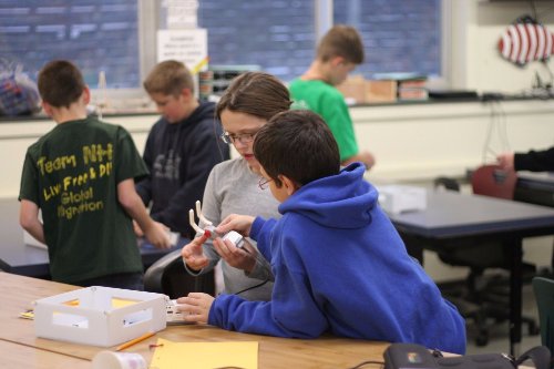  The young tinkerers collaborating on their first design. 