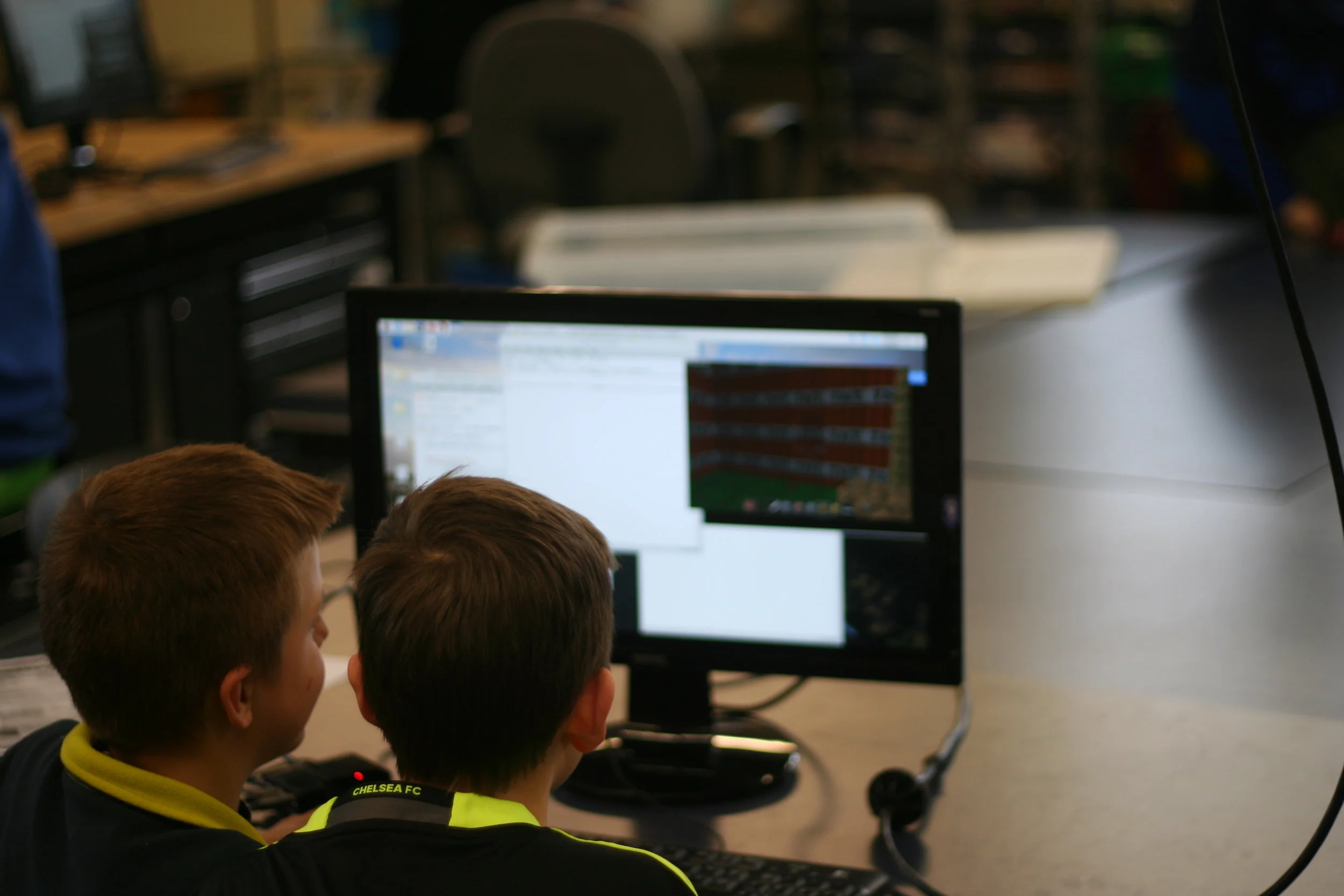  Gorham students generating a massive hollow block made of TNT. Giggles erupted as they set the TNT off and maxed out their computer's CPU 