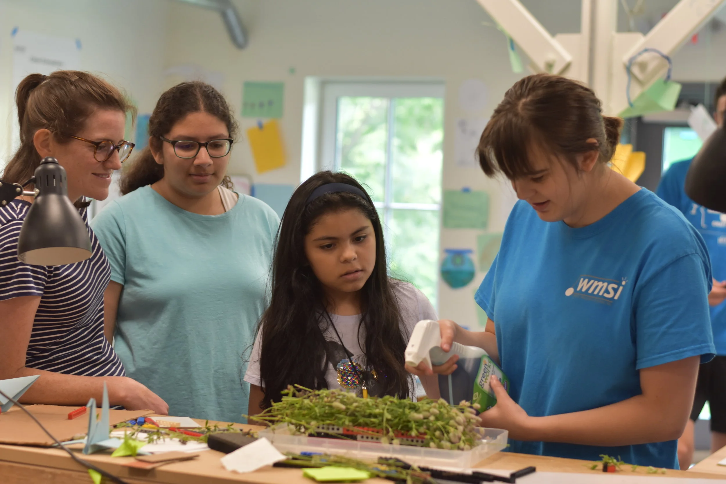  Campers test a roof design for their LEGO house, advised by Molly Maloy 