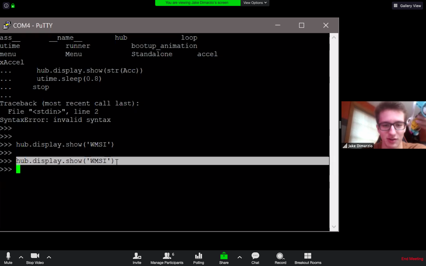  Jake explaining his programming during the intern group meeting 