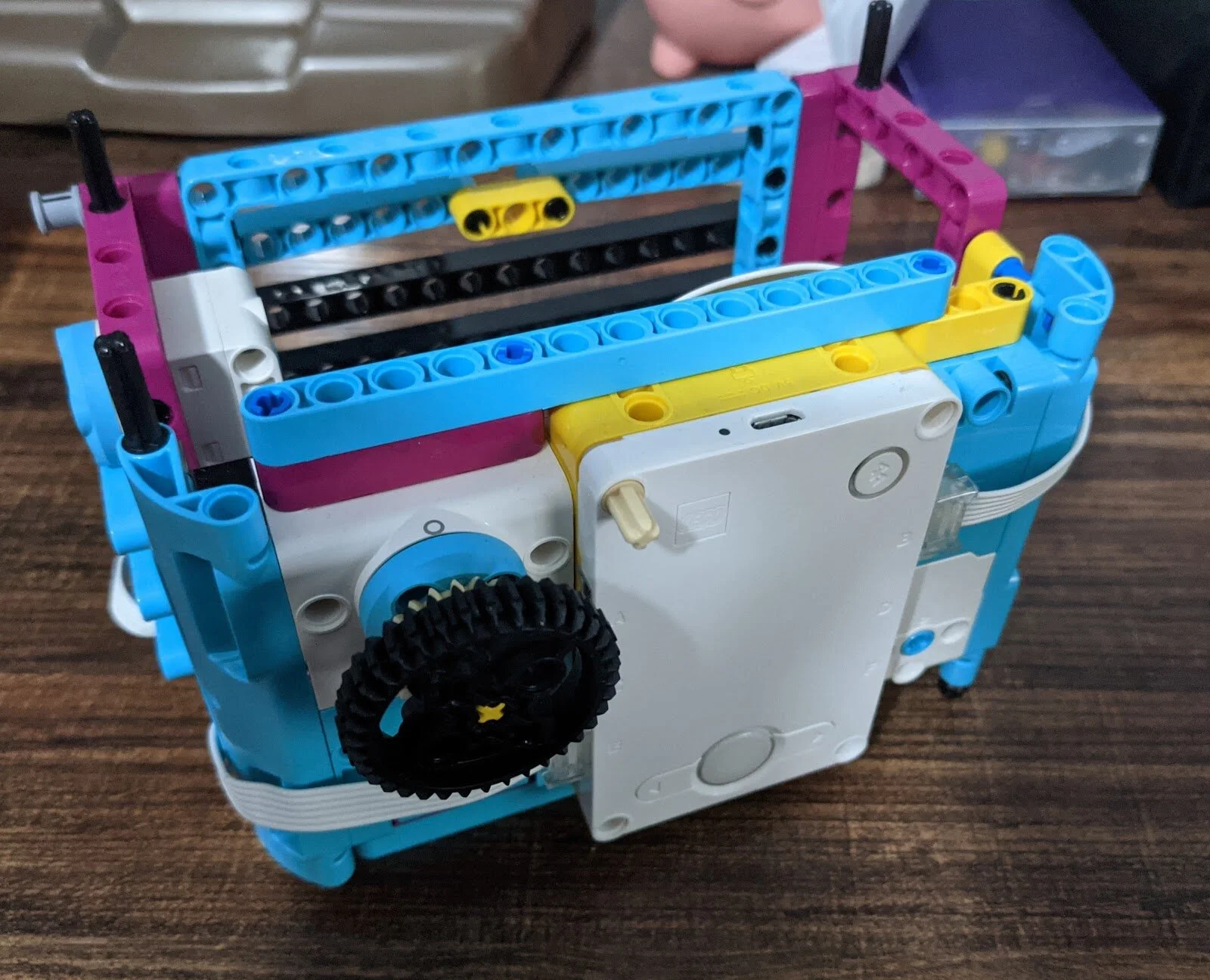  One of the 1 page guides I made was  The Safe Cracking Game : it shows how to use a motor with a wheel and how to develop a code that allowed the user to sense the position of the wheel, similar to a safe.  