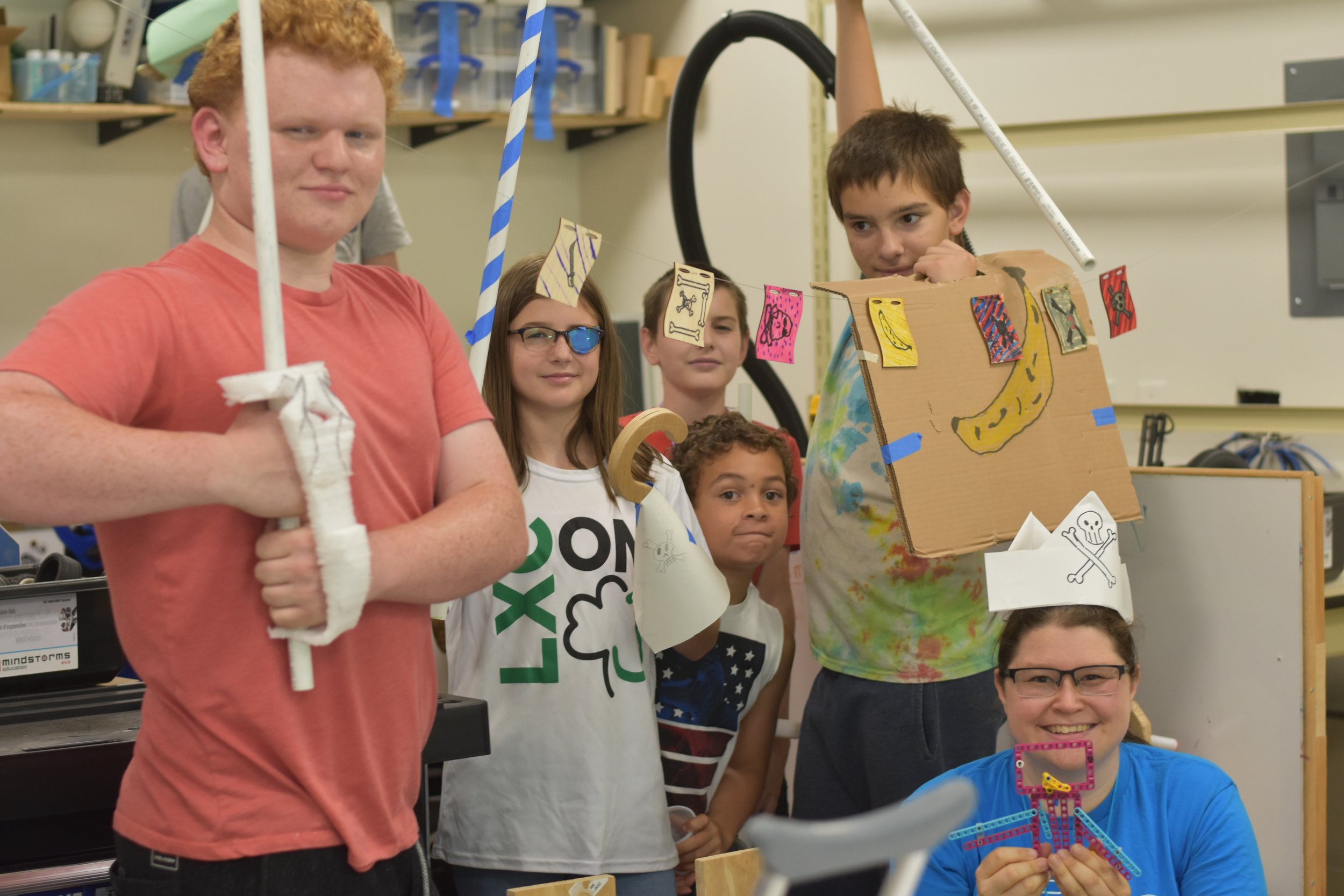  Students and WMSI instructors pose for a picture dressed as pirates 