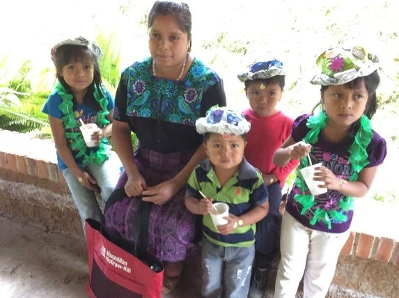 A Mayan family in a coffee-growing community in Guatemala participating in our Junior Master Gardener activities.