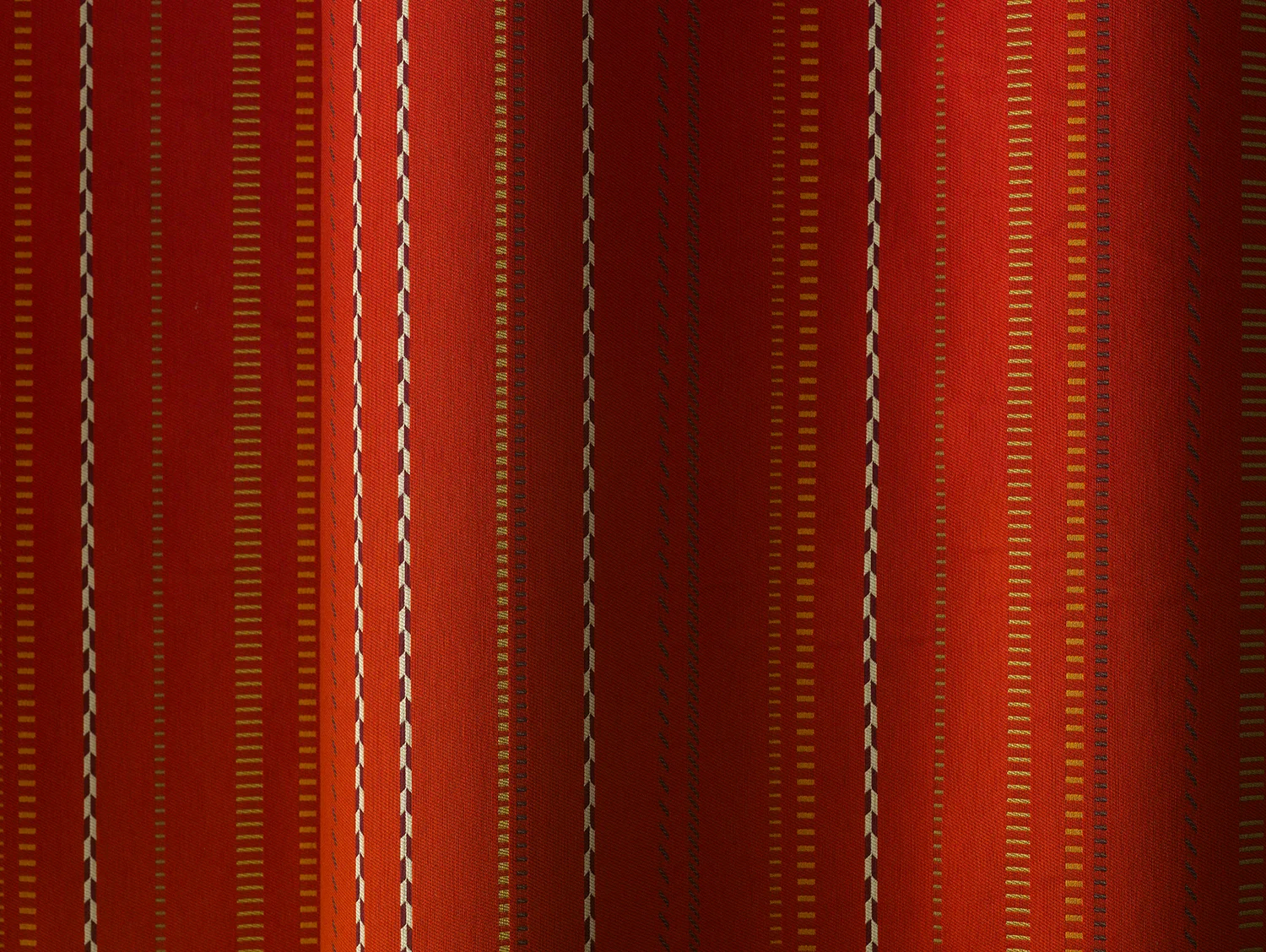 Inspired by hand-stitched, felt pillows adorned with ribbons, braids and hand-stitched bars that Blanchard crafts in her studio, the new Braids and Bars fabric is the designer’s woven translation of these creations. Featuring a clean, crisp, linear graphic composition, Braids and Bars offers unique, innovative color combinations that give designers everything from a subtle grey to the perfect bright.