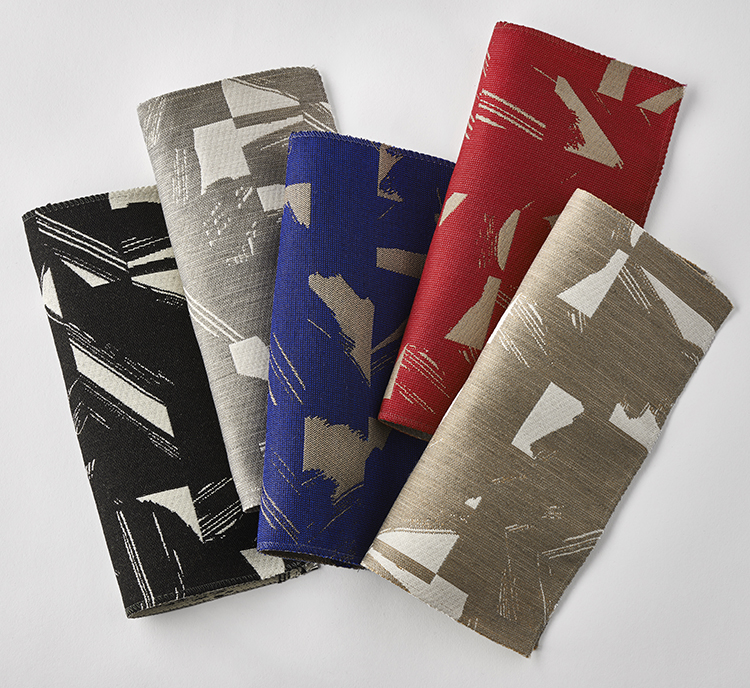 Cut Out - Inspired by the paintings of Franz Kline and Barnett Newman, Elodie created the pattern by painting a black and white abstract expressionist composition and then cut the painting into rectangles and shuffled the pieces until she found a good balance between positive and negative space. Woven with Sunbrella outdoor yards and bleach cleanable. Available in 5 colorways.