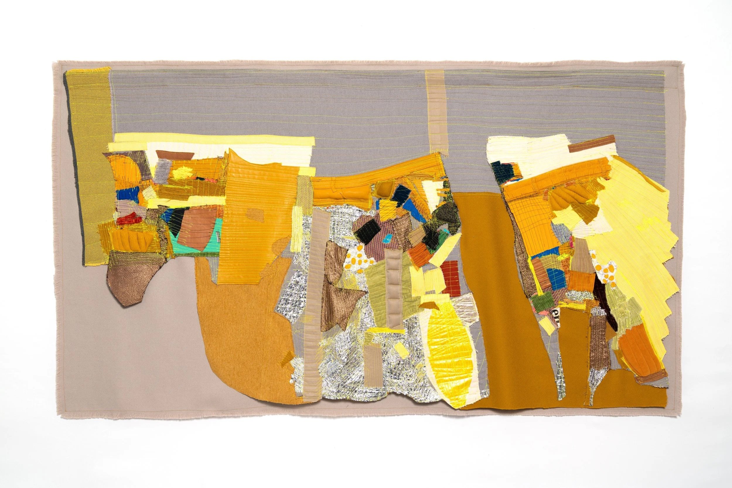 Yellow crevasse 
2025
H: 41  in x  73 in x 2  in
Found fabric, clothes , Mylar balloon
