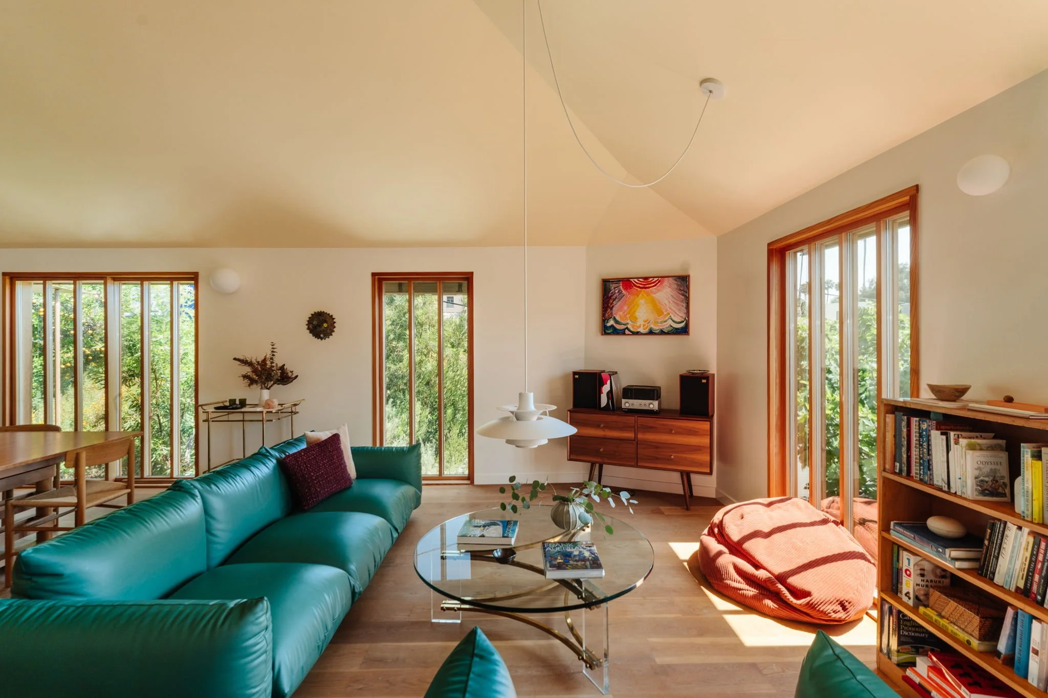 Modern Silver Lake living room with large windows, wood floors, and indoor outdoor connection