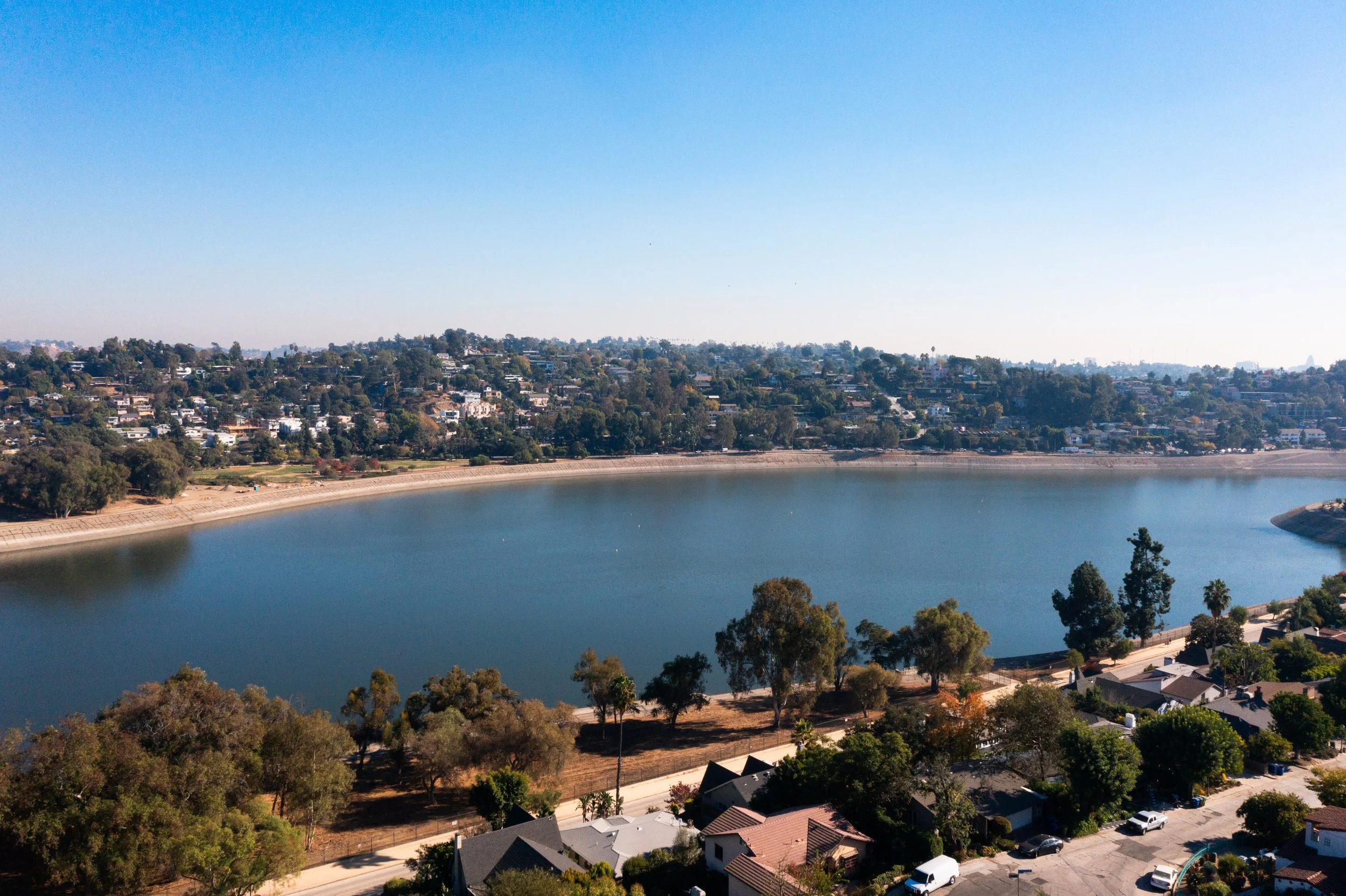 View of the Silver Lake Reservoir with surrounding homes in Los Angeles