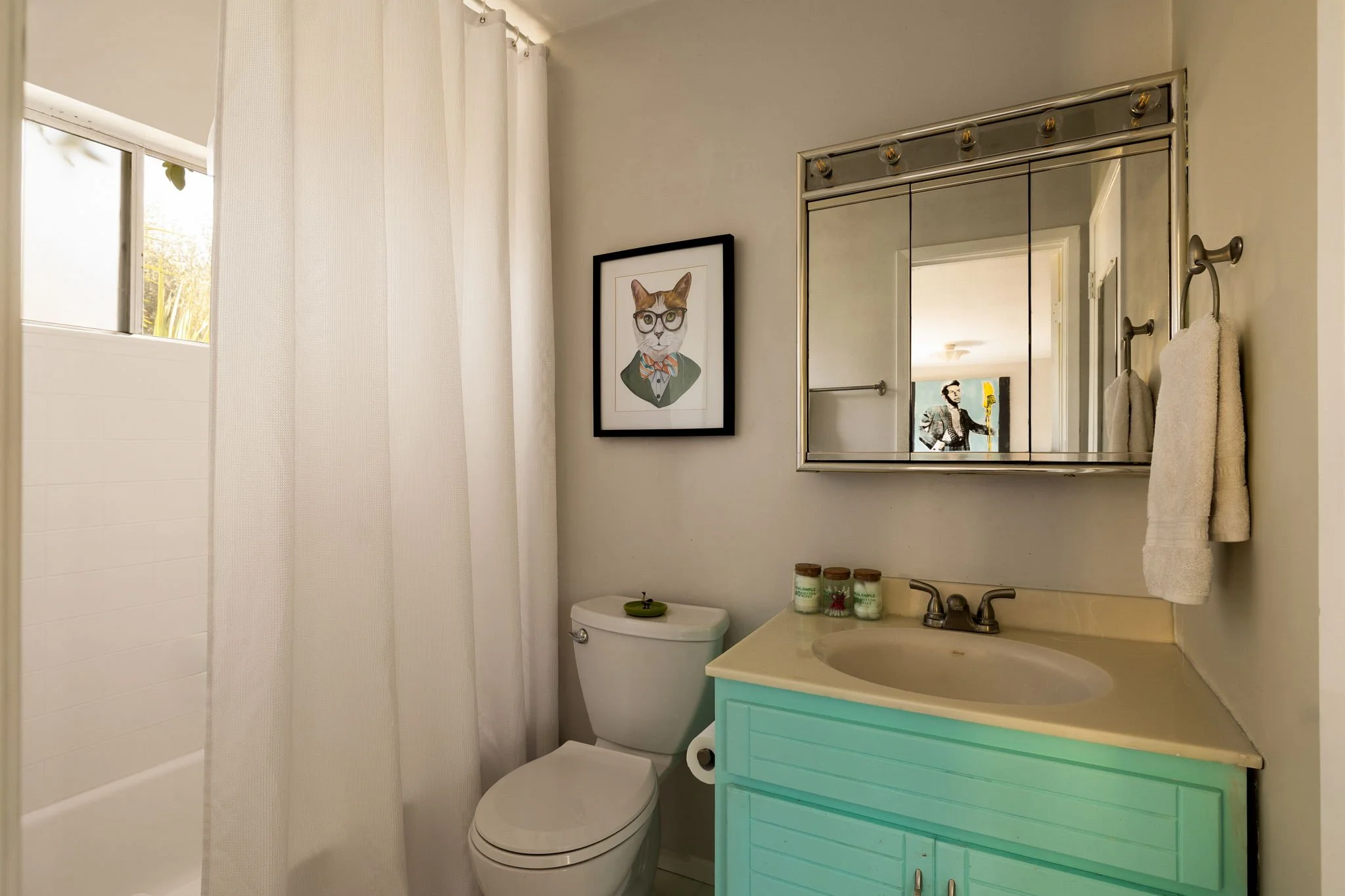Bathroom with vintage details and updated vanity in Glendale mid-century home