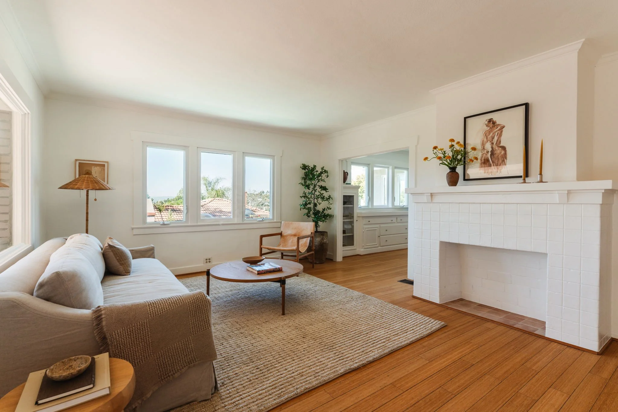 Bright craftsman living room with fireplace and built-in details in Highland Park home