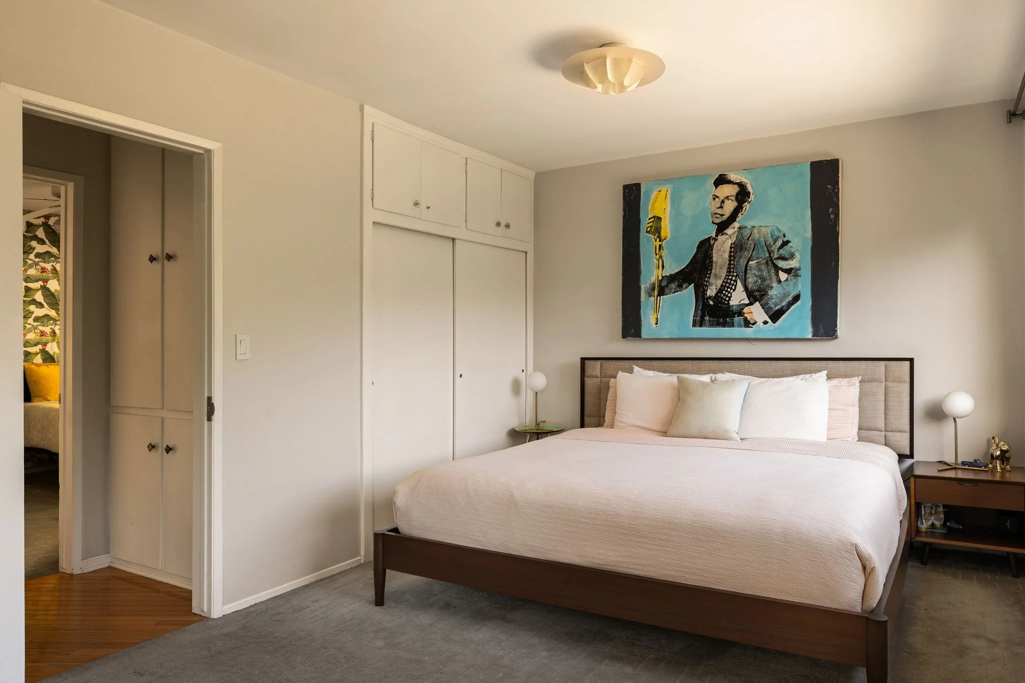 Bedroom with natural light and simple mid-century design at 941 Cavanagh Rd Glendale