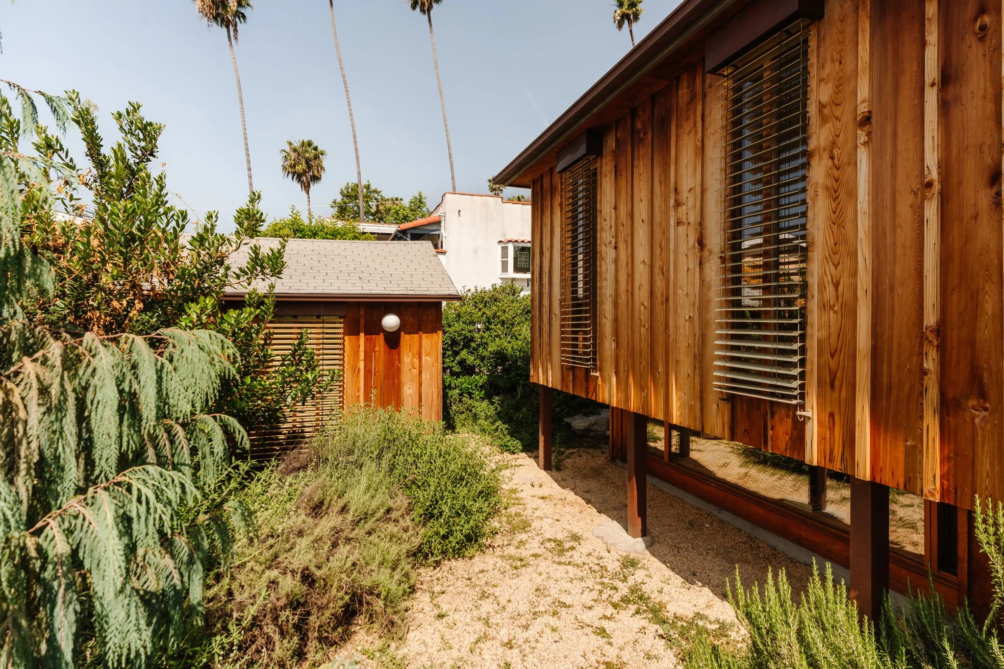 Detached studio and landscaped yard with redwood exterior in Silver Lake architectural property