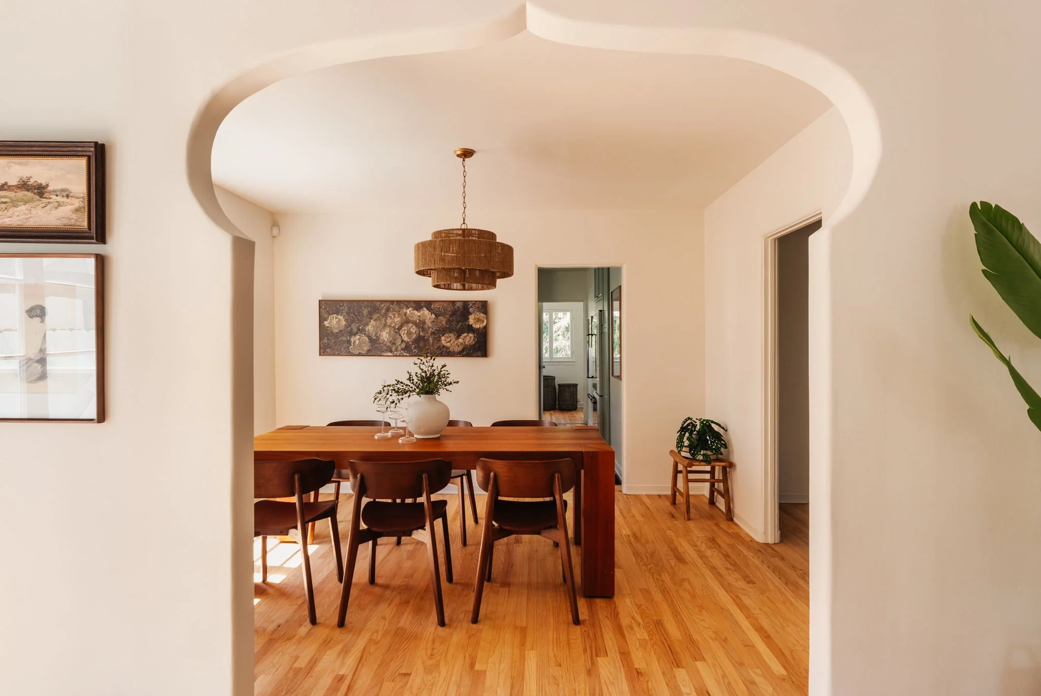 Dining room framed by Moorish style archway in a 1936 Craftsman bungalow in Atwater Village Los Angeles