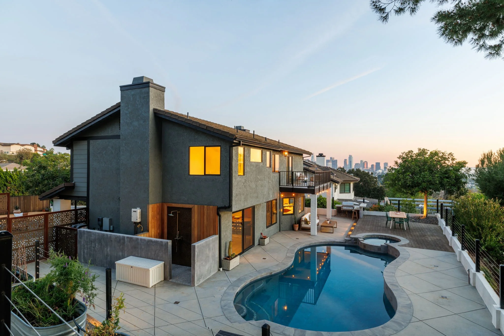 Silver Lake hillside home exterior at 1721 McCollum St with panoramic views and landscaped setting