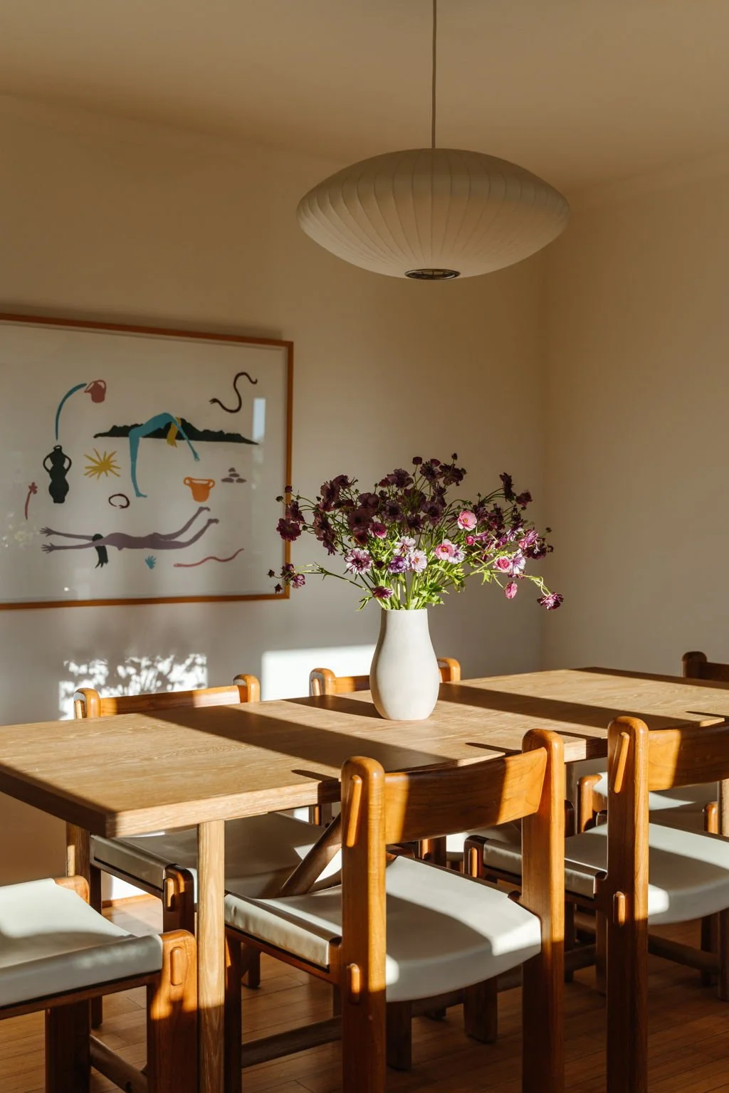 Craftsman dining room with natural light and wood finishes in Highland Park home