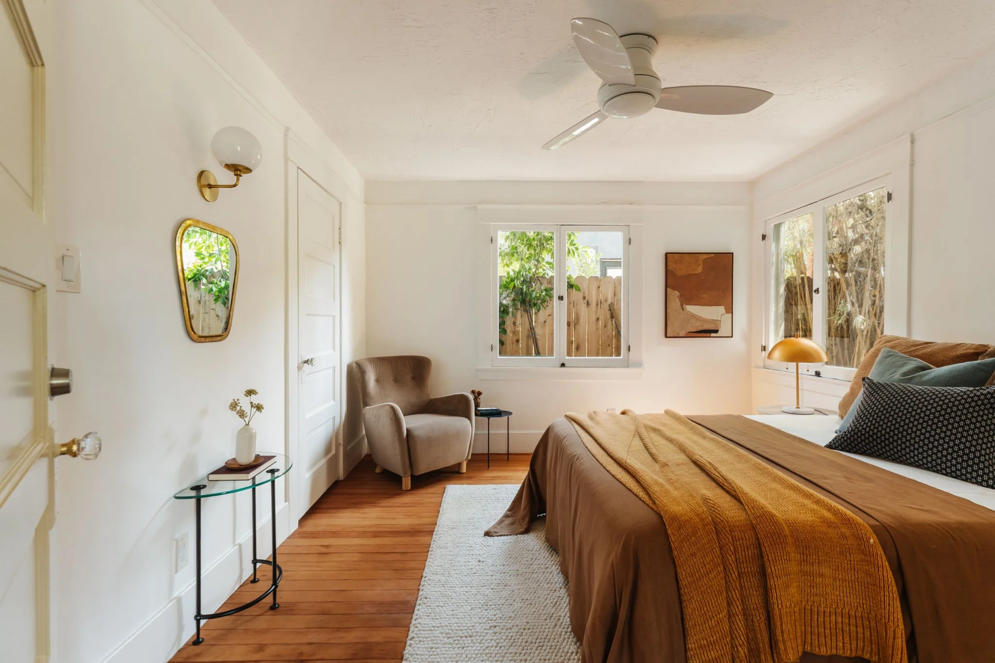 light filled bedroom with wood floors in Silver Lake Craftsman home Los Angeles
