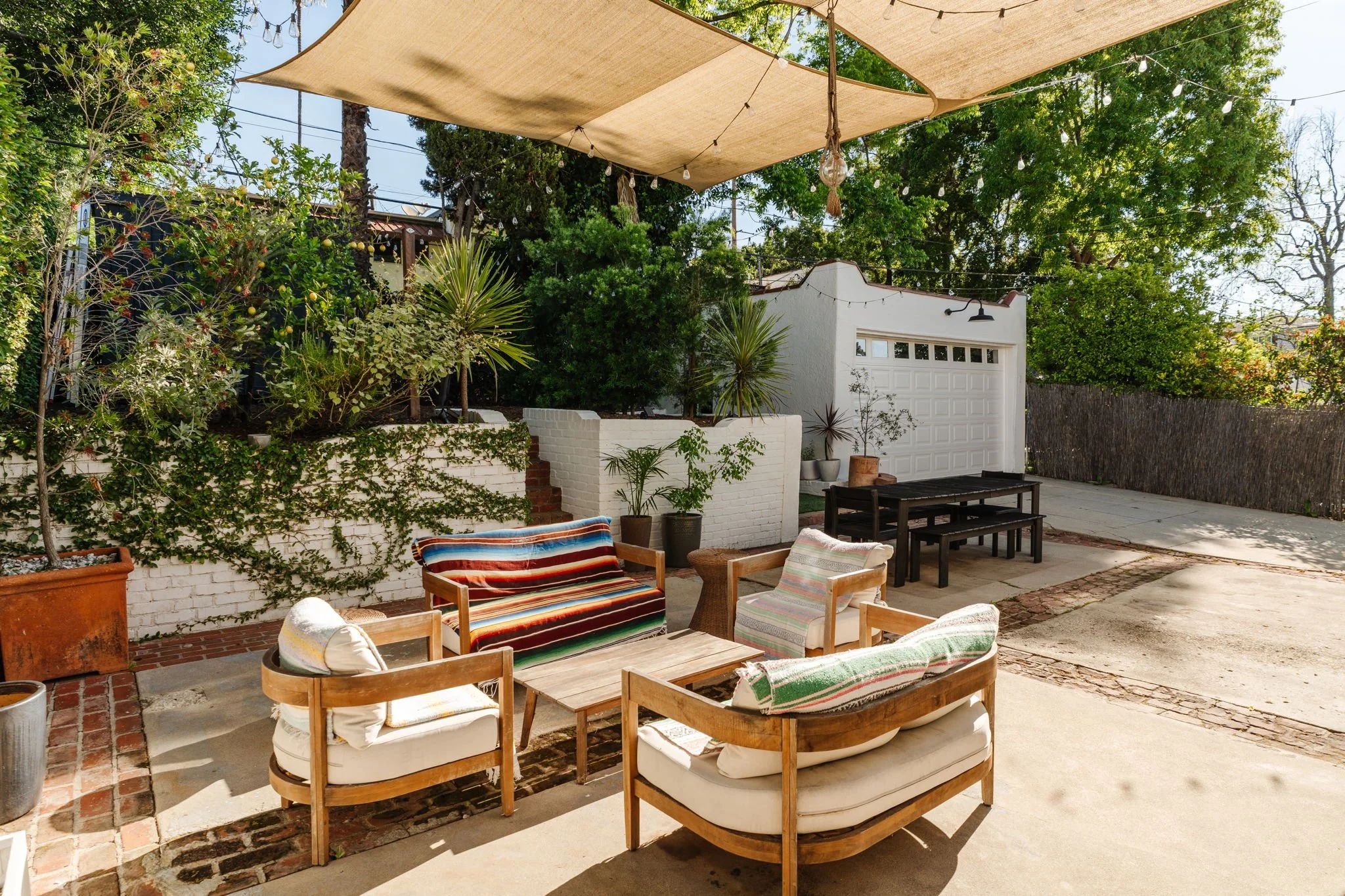 Backyard patio and outdoor seating area in Silver Lake Spanish Revival home