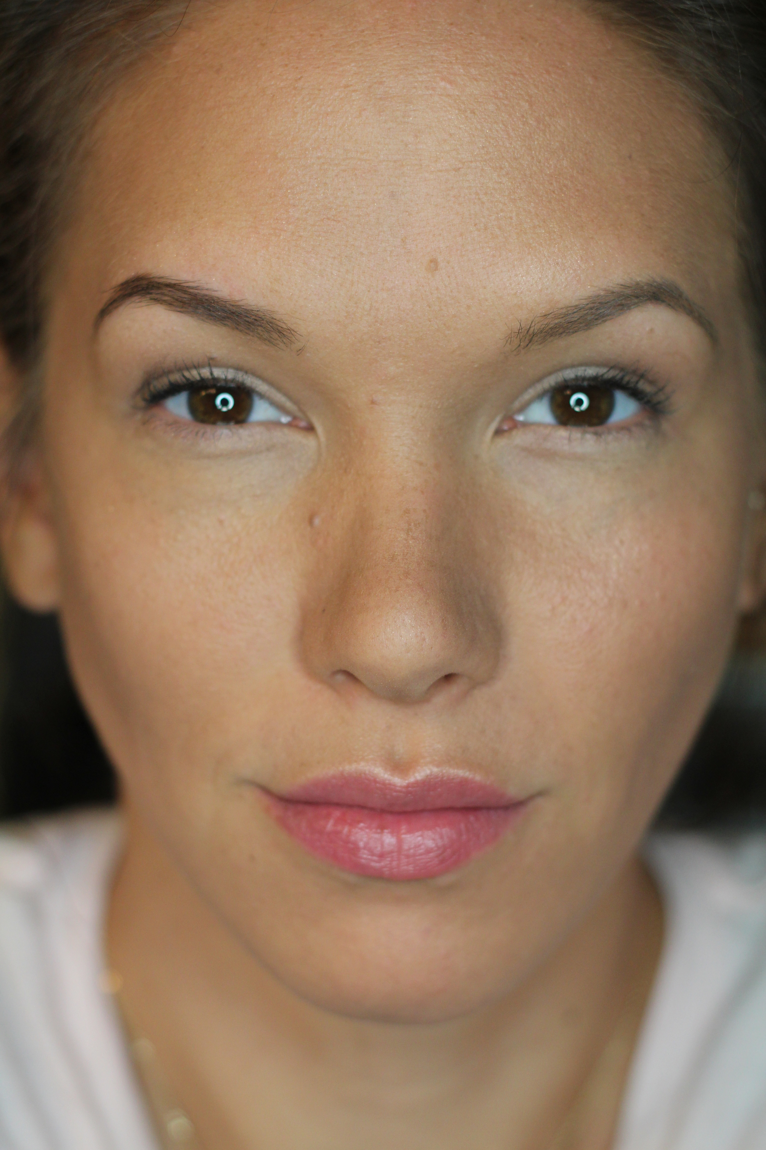 Powder Contour Application applied to the hollows of the cheeks, bridge of the nose, hairline and jaw line.