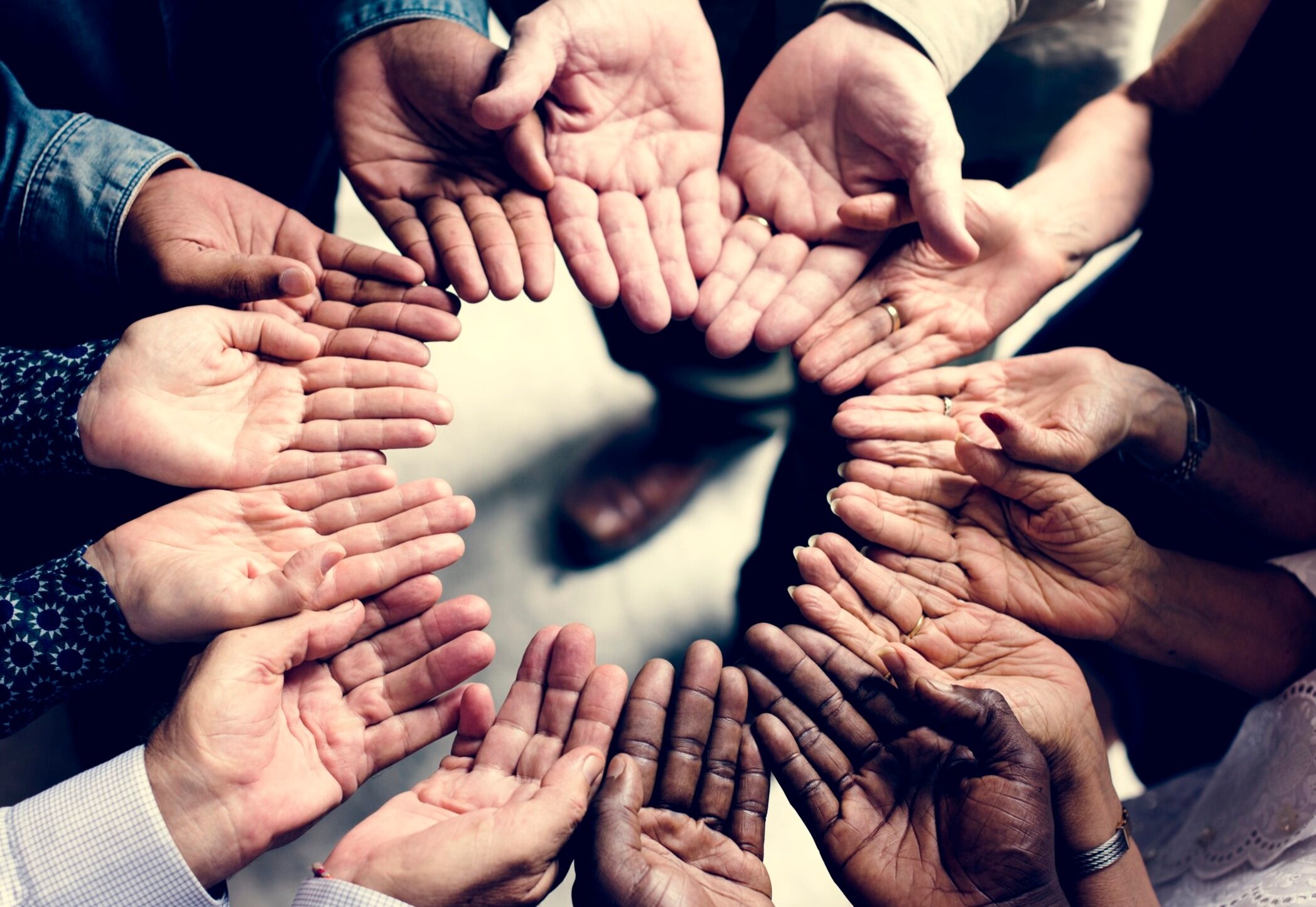 group-of-diverse-hands-in-a-circle-PWEVJ3N.jpg
