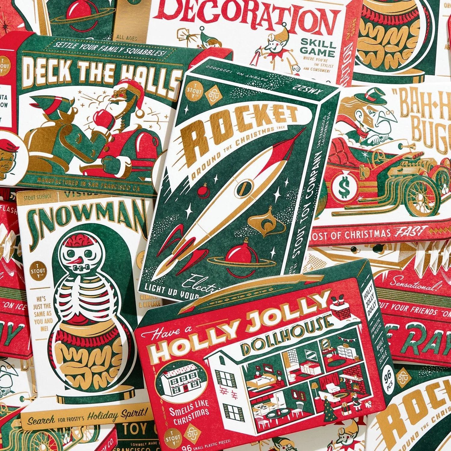 Vintage holiday-themed board game boxes with retro illustrations, including "Deck the Halls," "Rocket Around the Christmas Tree," and others. Designs feature festive imagery like Santa, snowmen, and Christmas decorations in red, green, and gold color