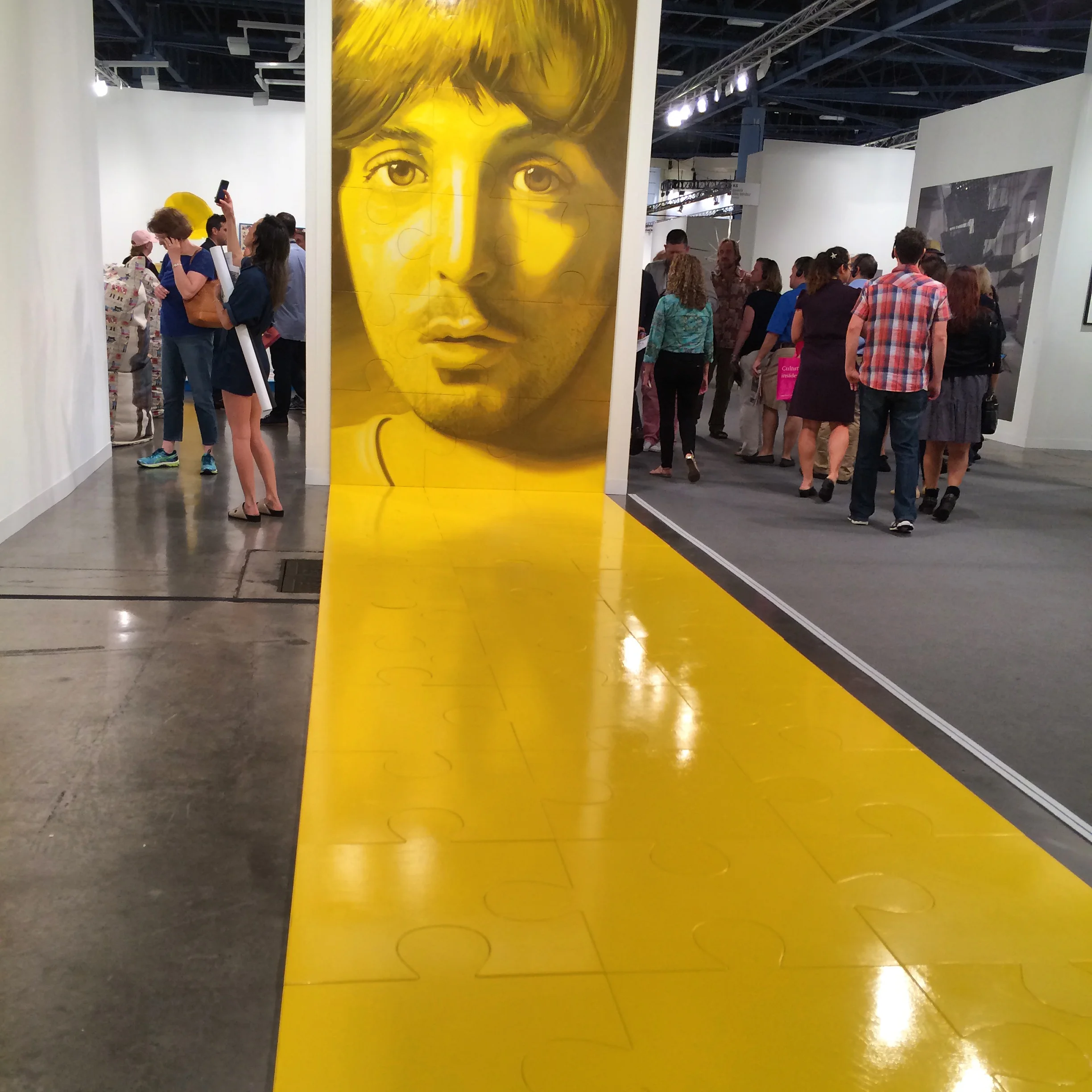 Jack Early's solo presentation at Fergus McCaffrey (New York and St. Barth’s) had us with the giant blown-up portraits of Paul McCartney and John Lennon, facing each other across a floor of bright yellow puzzle pieces. Yes, it was fun, intelligent, and had us all taking snaps.