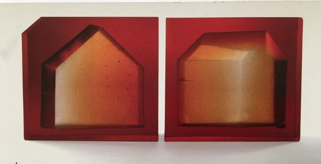 Carol Lawton. Fault Line Houses, 2005. Cast lead glass. 12 x 33 x 2.5 in.