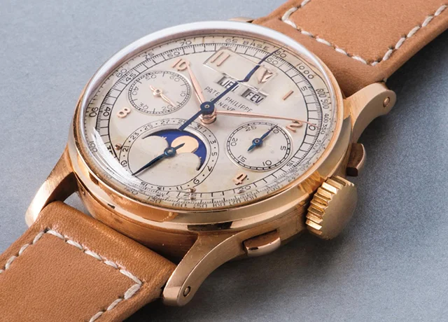 Lot 196, Patek Philippe pink gold perpetual calendar chronograph wristwatch with moon phases and tachymeter scale, 1948, Phillips (November 13)