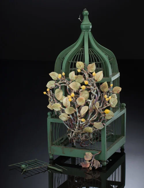 Kathleen Elliot. Liberty #1 (2015). Glass, found bird cage. 23 x 11 x 11 in.