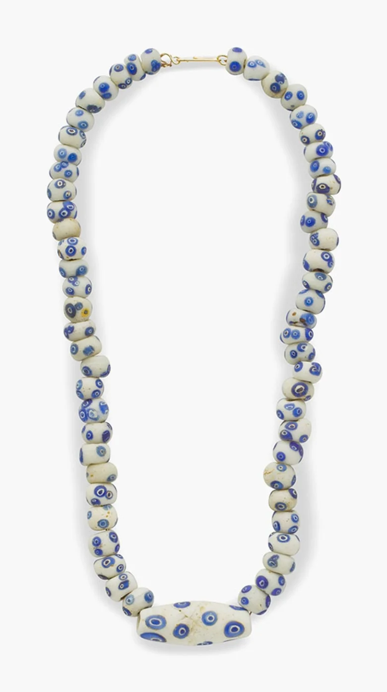 A Carthaginian white and blue glass eye-bead necklace. Circa 4th-2nd century B.C. 18¾ in (47 cm) long. Estimate: $5,000-7,000. This lot is offered in Ancient Jewelry: Wearable Art, 29 November–8 December 2016, Online