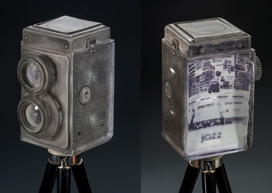   Echoic Memory , 2012; 5 x 4.75 x 6.5 inches; glass, ceramic decal, paint, antique Kodak tripod 