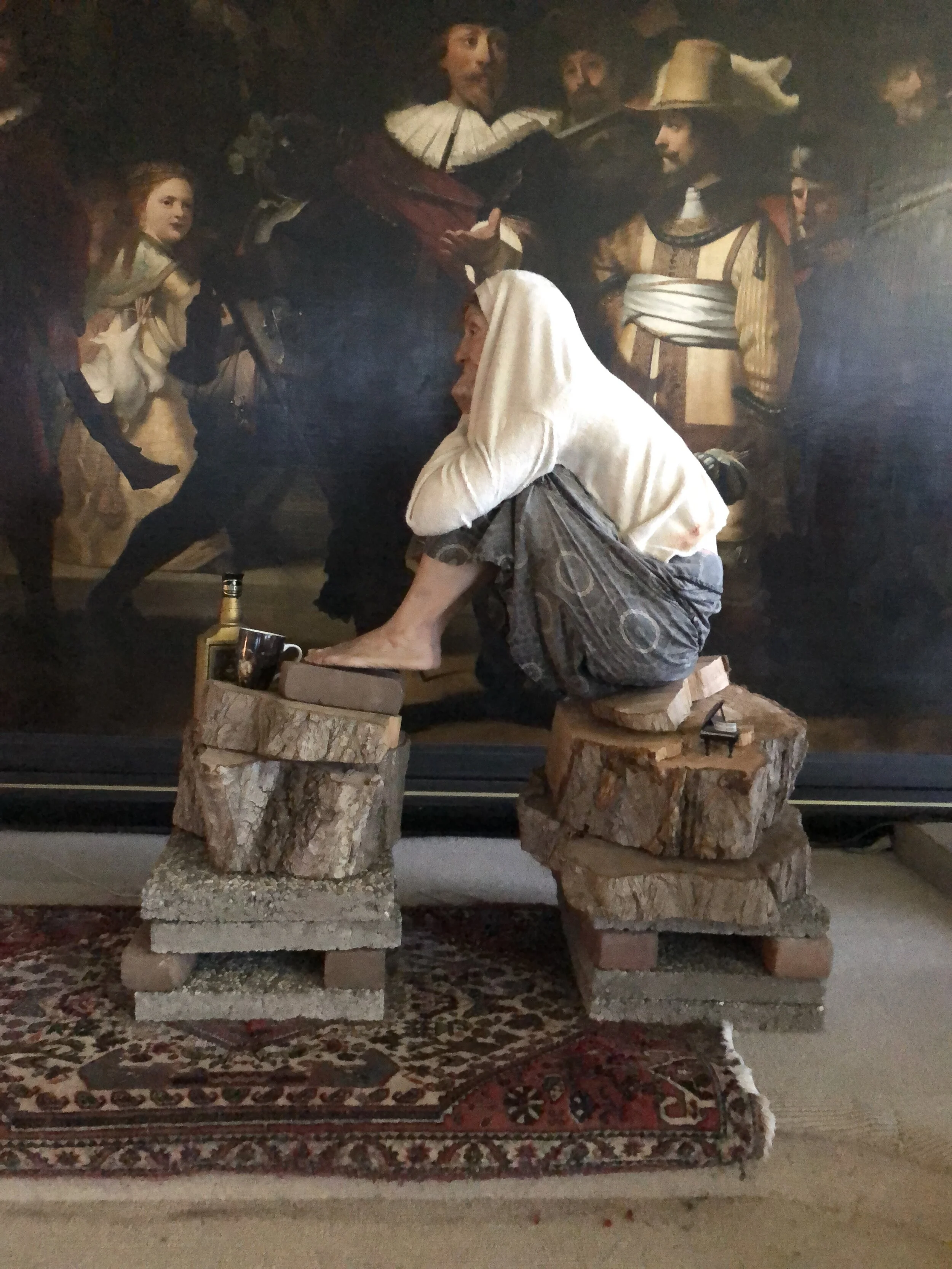  An interesting reproduction of a beautiful Old Master painting behind a contemporary sculpture. 