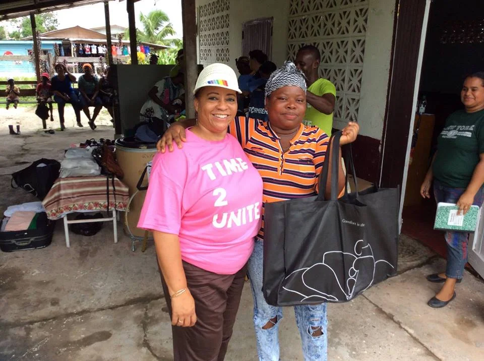 GF volunteer Deborah Blackmore with one of the beneficiaries in Soesdyke.