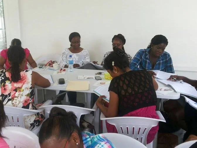 Participants at a recent event held at the Sunrise Center using one of the donated tables. 