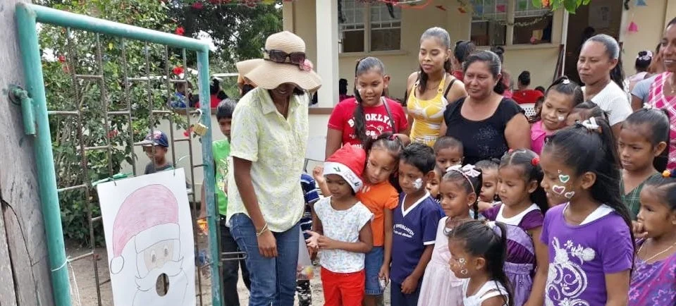 Mashabo Christmas Party - Children of Masahbo being welcome to the Health Center for their party..jpg